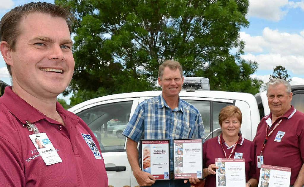 Crime Stoppers state operations manager Jonathon Cowley presented Cameron Schoenfisch, Pam and Keith Ritchie with their awards. Crime Stoppers state operations manager Jonathon Cowley presented Cameron Schoenfisch, Pam and Keith Ritchie with their awards.
